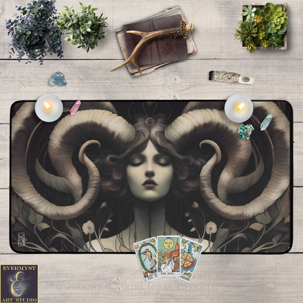 a large, detailed illustration of a woman's face with large, curled horns, surrounded by various objects such as plants, cards, and antlers.