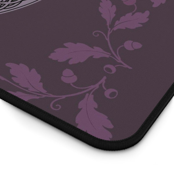 a purple floral pattern with leaves and acorns on a dark purple background.