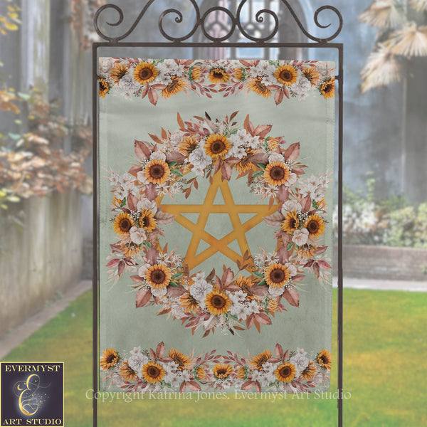 a banner with a floral design and a star in the center, displayed outdoors on a metal stand.