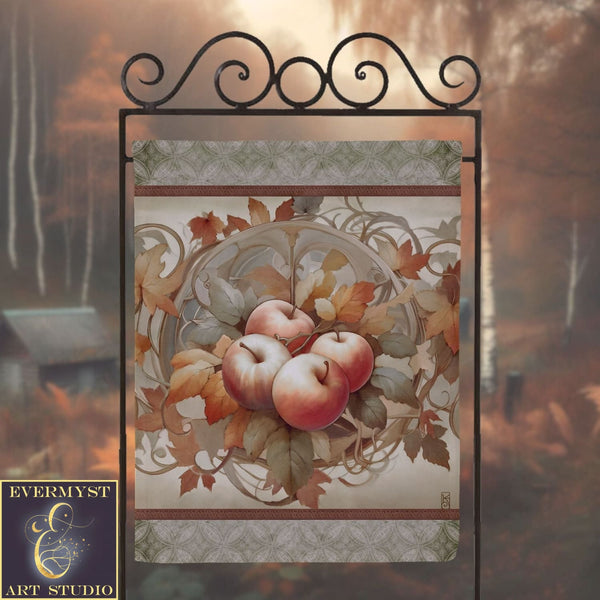 a picture of apples hanging on a metal frame