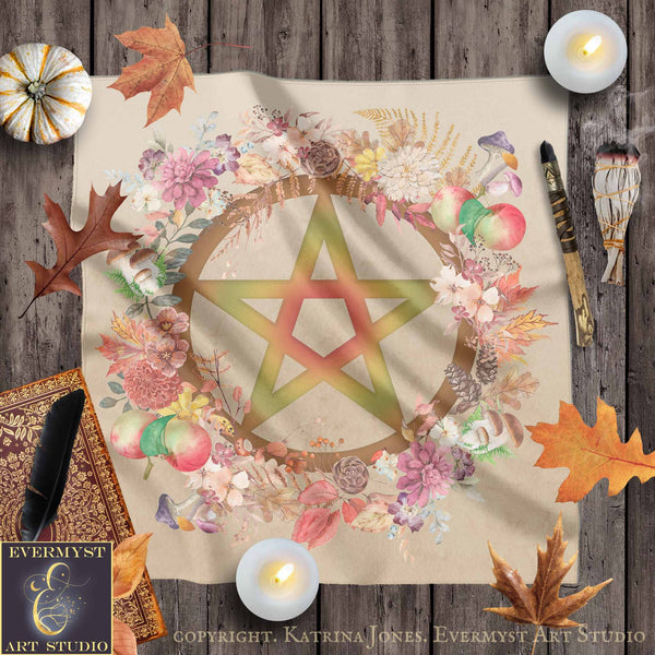 a large, colorful star-shaped design surrounded by a wreath of flowers and leaves, with candles and autumn leaves scattered around.