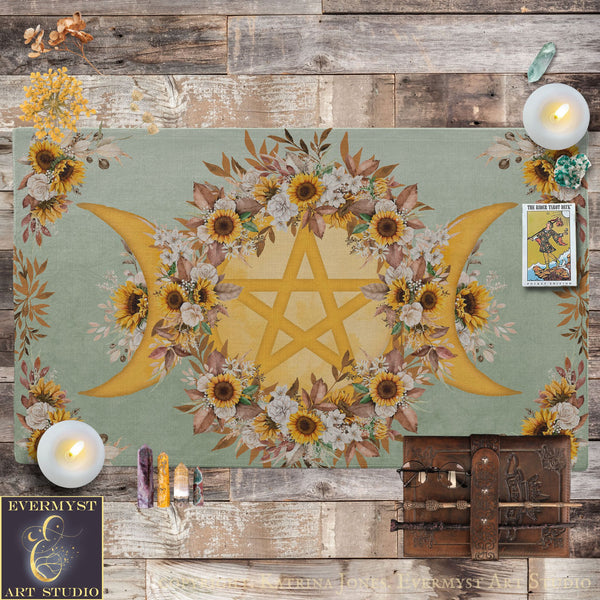 a vibrant and colorful design with a star-shaped motif surrounded by a floral arrangement, including sunflowers and other flowers. The design is set against a wooden background, creating a rustic and earthy atmosphere. The image also includes various objects such as candles, crystals, and a book, suggesting a connection to spirituality or a creative workspace.