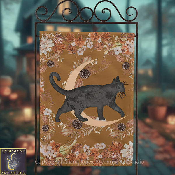 a black cat walking on a crescent moon, surrounded by autumn leaves and flowers.