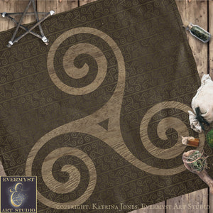 a large, intricate spiral design on a dark background, with a star-like shape on the left side.