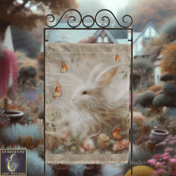 A white rabbit with a flowing mane and delicate flowers is depicted in a garden setting, surrounded by butterflies and lush greenery.