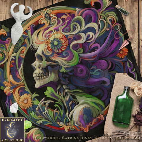 The image is a vibrant and intricate artwork featuring a stylized skull surrounded by swirling patterns and colors, including flowers and leaves. The artwork is displayed on a wooden surface, with various objects such as a bottle, a sculpture, and a bouquet of flowers in the background.