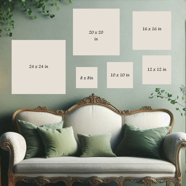 a white sofa with green throw pillows, set against a green wall with six framed artworks of varying sizes displayed above it.