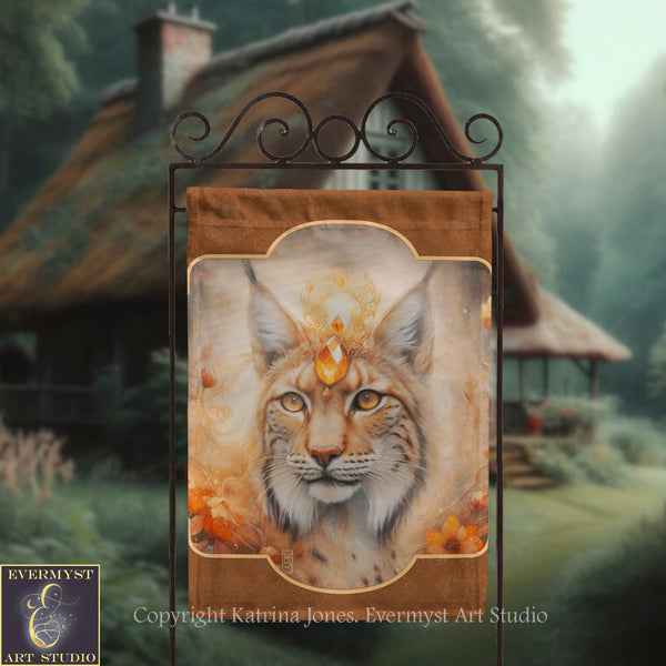 a banner with a close-up of a cat's face, adorned with a crown and a gemstone, set against a rustic background with a thatched roof and a wooden structure.