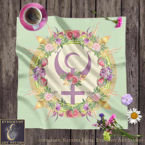 a vibrant floral design with a purple symbol at its center, surrounded by various flowers and leaves. The design is set against a light green background, creating a visually appealing and colorful composition.