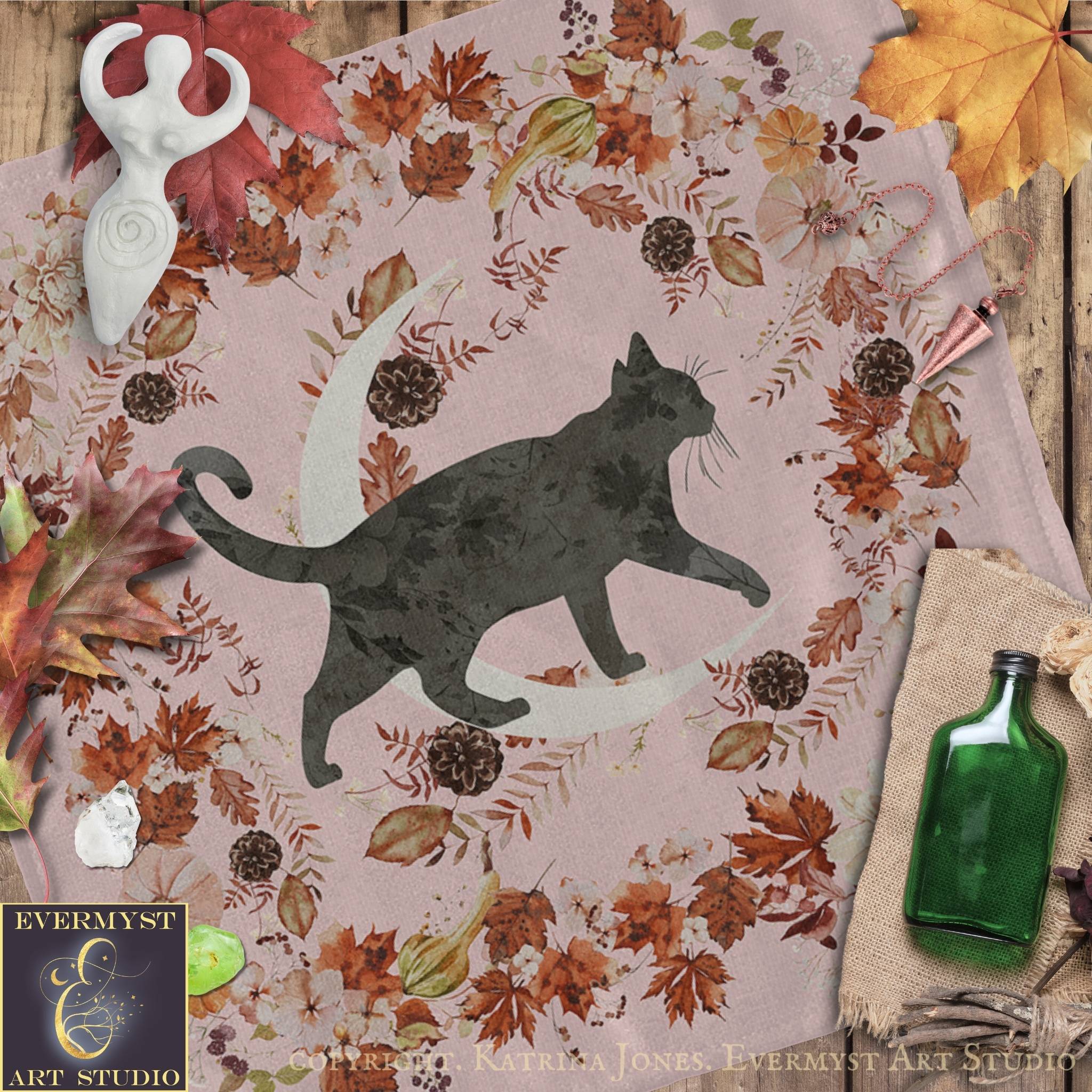 a black cat silhouette against a floral background, surrounded by autumn leaves and a crescent moon.