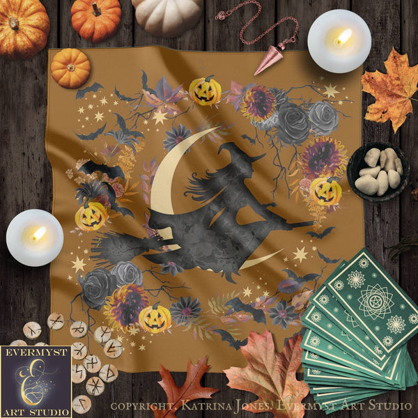 a Halloween-themed scene with various spooky and festive elements. There is a witch on a broomstick, a crescent moon, pumpkins, flowers, and candles. The scene also includes tarot cards, a deck of playing cards, and some autumn leaves. The overall atmosphere is one of celebration and the spirit of Halloween.