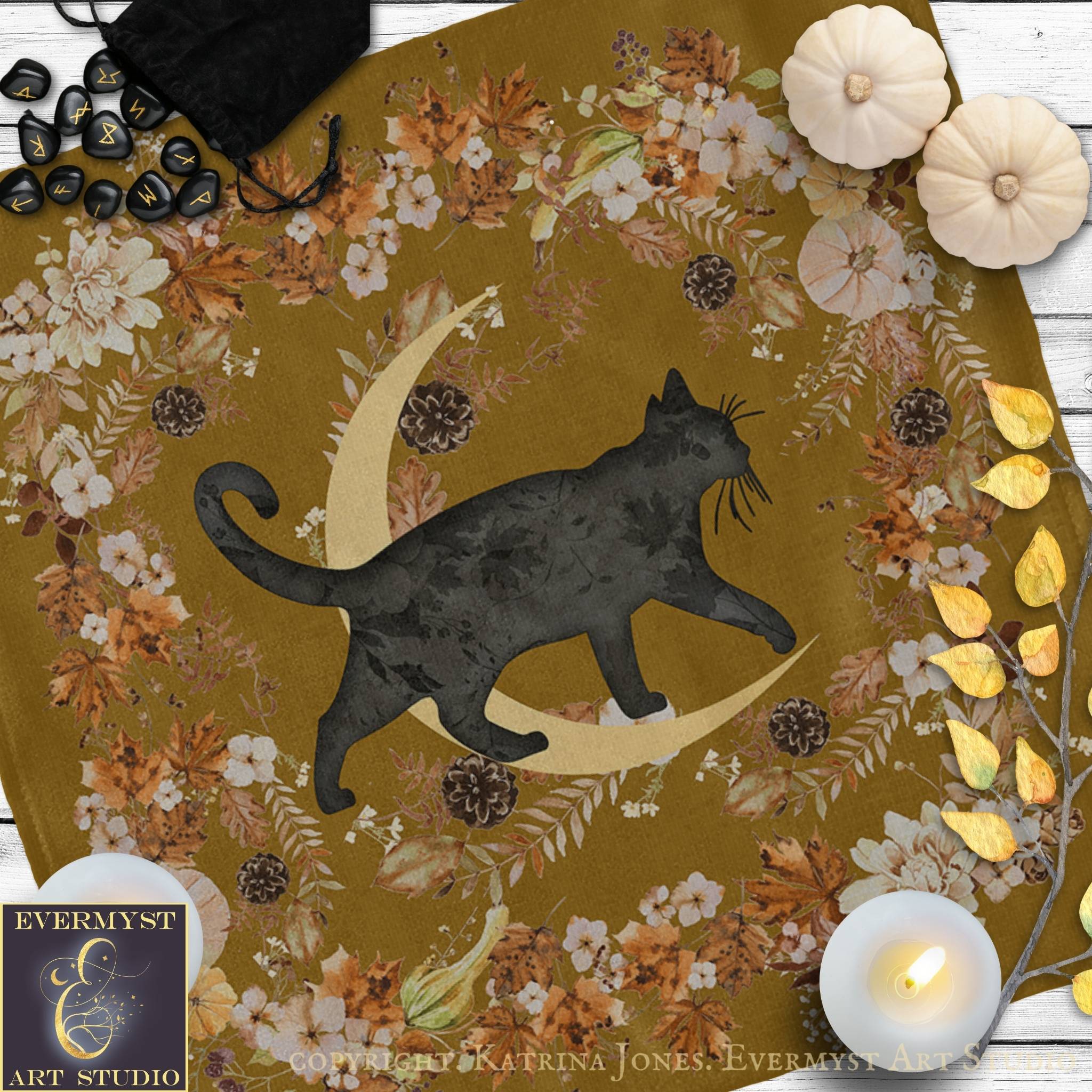 a black cat silhouette against a floral background, with a crescent moon and autumn leaves scattered around.