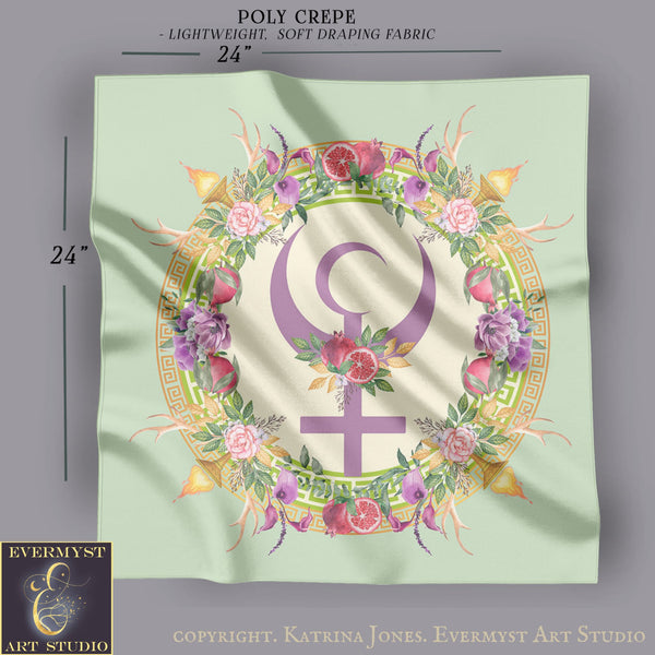 The image is a square with a 24-inch wide border, featuring a floral design around a symbol. The design includes various flowers, leaves, and a crescent moon. The image is described as a "Poly Crepe" with a "Lightweight, Soft Draping Fabric" and is part of a "24" size. The image is credited to "EVERMYST ART STUDIO" and includes a copyright notice by "KATRINA JONES".