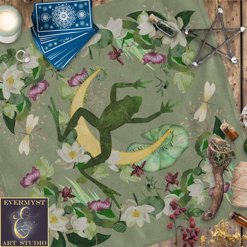 a blanket with a lizard and flowers on it