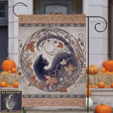a black cat sitting on top of a table next to pumpkins