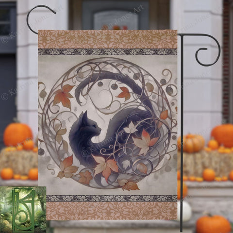 a black cat sitting on top of a table next to pumpkins