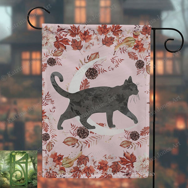 A banner featuring a black cat silhouette against a floral background, with a crescent moon and autumn leaves.
