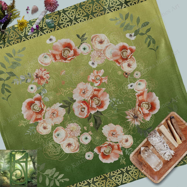 a green table cloth with flowers on it