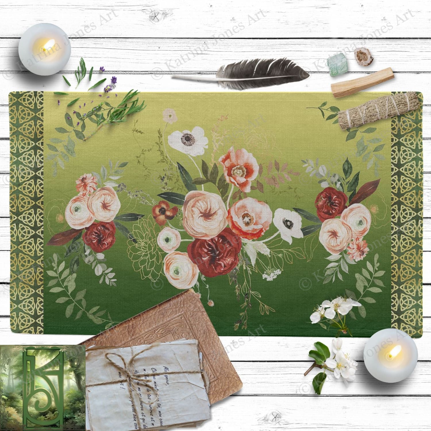 a table topped with a green rug covered in flowers