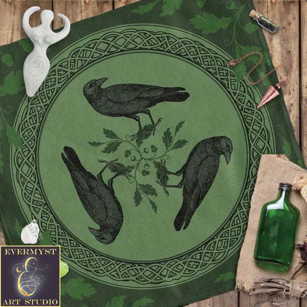 a green table cloth with three birds on it