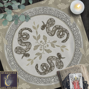 a table topped with a white plate covered in snakes