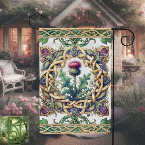 a garden flag with a picture of a thistle
