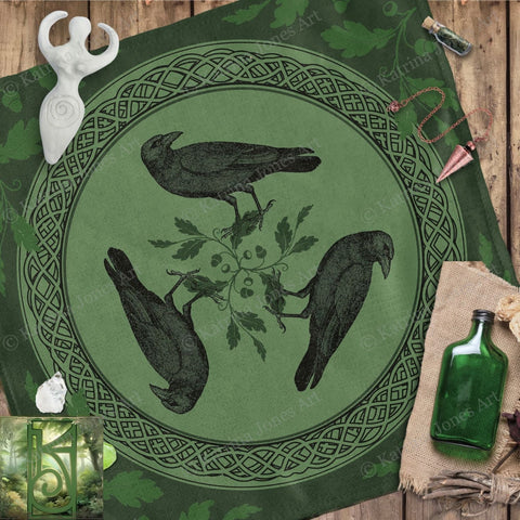 a green table cloth with three birds on it