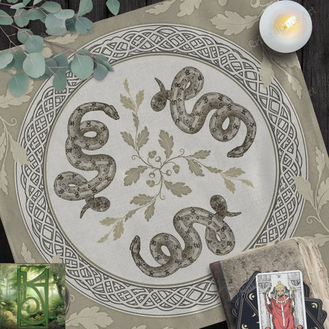 a table topped with a white plate covered in snakes