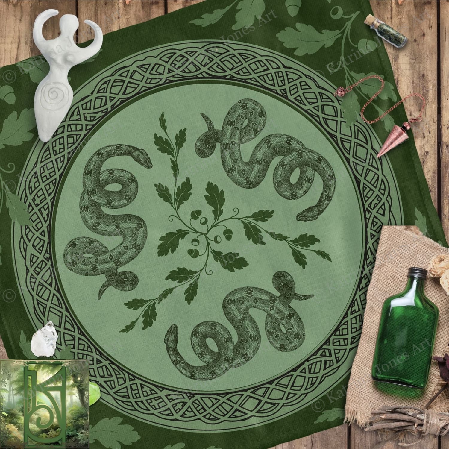 a green table cloth with a picture of a snake on it