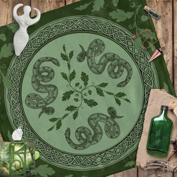 a green table cloth with a picture of a snake on it
