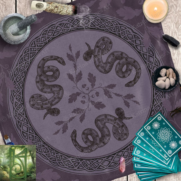 a table topped with a purple cloth covered in snakes