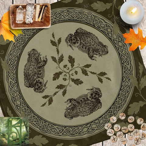 a table with candles, a plate with owls and leaves on it