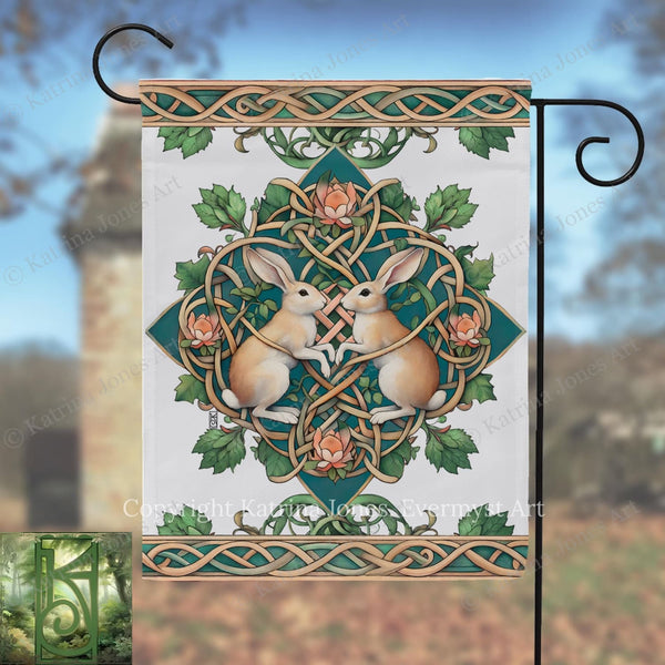 a decorative banner with a floral design and two rabbits, one brown and one white, surrounded by a circular pattern of leaves and flowers.