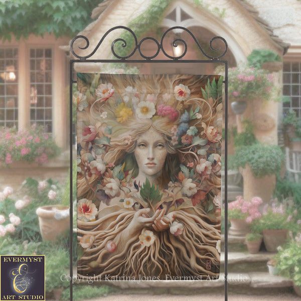 a large, ornate metal sign with a detailed floral design and a woman's face at the center. The sign is set against a backdrop of a garden with potted plants and flowers.