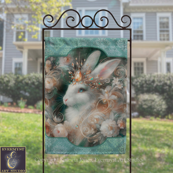 a large, ornate banner with a white rabbit wearing a crown and surrounded by flowers, placed in front of a house.