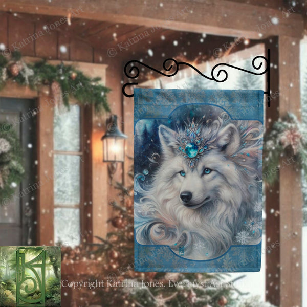 A large blue flag with a white wolf's face on it, hanging on a metal bracket in front of a wooden structure with Christmas decorations.