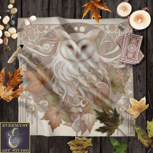 a picture of an owl surrounded by autumn leaves