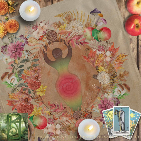 The image is a vibrant and colorful collage featuring a central design surrounded by various flowers, mushrooms, and other natural elements. The collage is set against a rustic wooden background, and there are two lit candles and a tarot card visible in the scene.