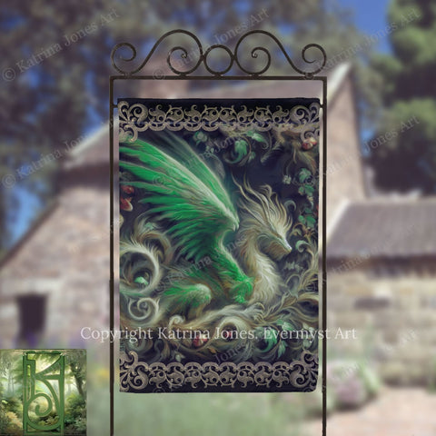 a large, ornate banner with a detailed illustration of a green dragon-like creature on it. The banner is displayed outdoors, possibly in a garden or park setting.