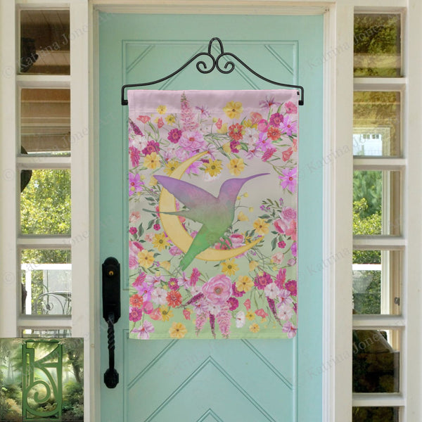 a blue door with a bird and flowers on it