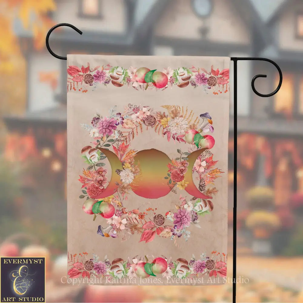 A banner with a floral design featuring three crescent moons surrounded by various autumn-themed elements, such as leaves, flowers, and fruits.