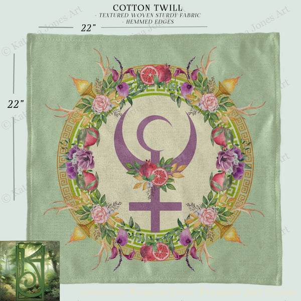 The image is a square print featuring a floral design with a crescent moon symbol in the center, surrounded by various flowers and leaves. The print is described as a "Cotton Twill" with a textured woven fabric and a "HEMMED EDGES" pattern.