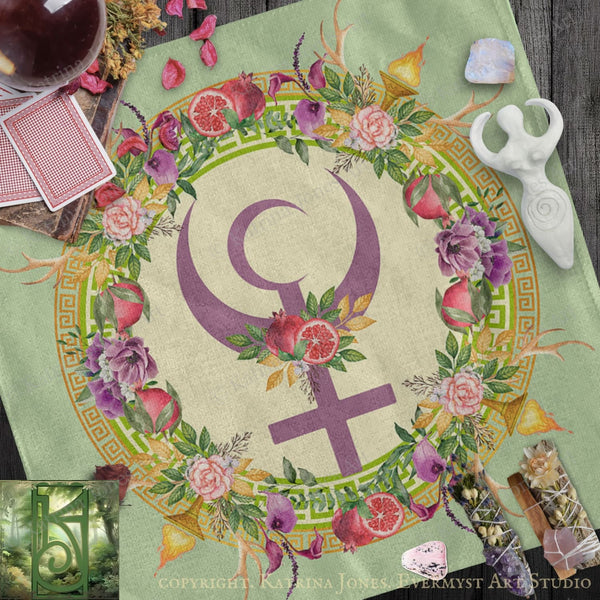 a vibrant and colorful design with a large purple symbol surrounded by a floral wreath, all set against a green background. The design includes various flowers, leaves, and a crescent moon, creating a visually striking and intricate composition.