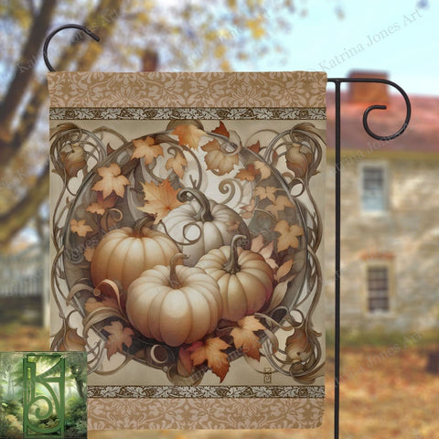 a flag with a picture of pumpkins and leaves on it