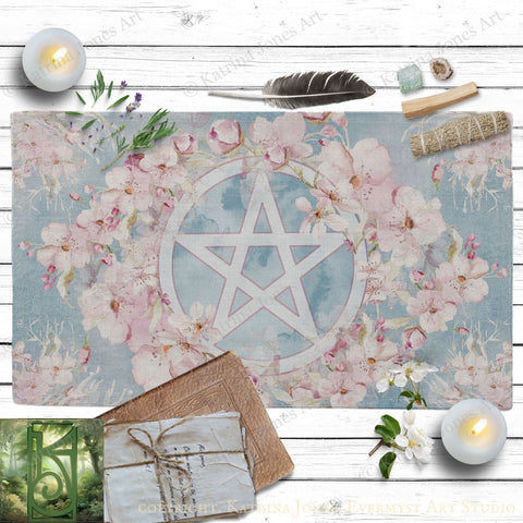 a picture of a pentagram surrounded by flowers and candles