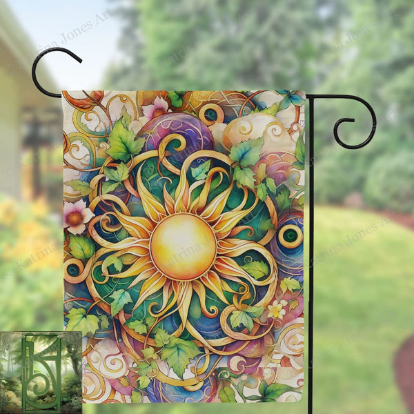 a garden flag with a sun design on it
