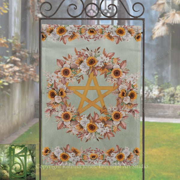 a banner with a floral design and a star in the center, displayed outdoors on a metal stand.