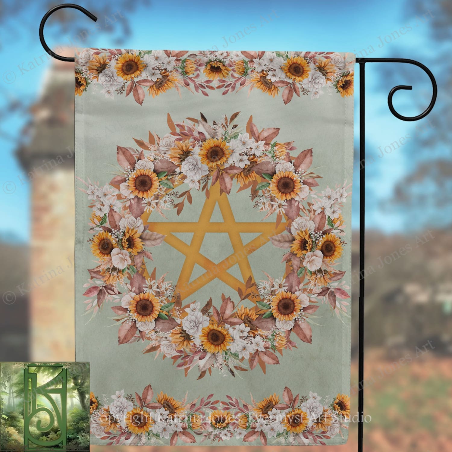 a banner with a floral design and a star, hanging on a metal hook.