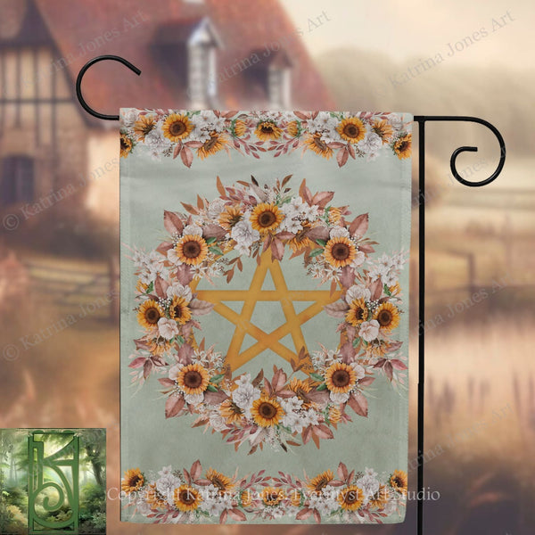 A banner with a floral design and a golden star in the center, hanging on a black metal hook.