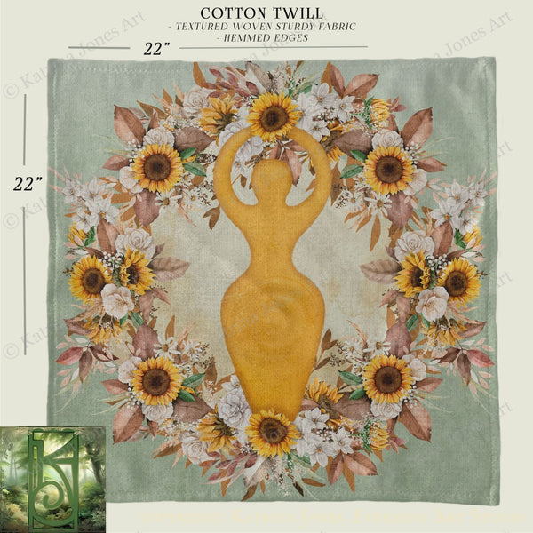 The image is a square print featuring a wreath of flowers surrounding a golden female figure, with the text "COTTON TWILL - TEXTURED WOVEN STURDY FABRIC HEMMED EDGES" and dimensions "22" and "22" on the left and right sides respectively.